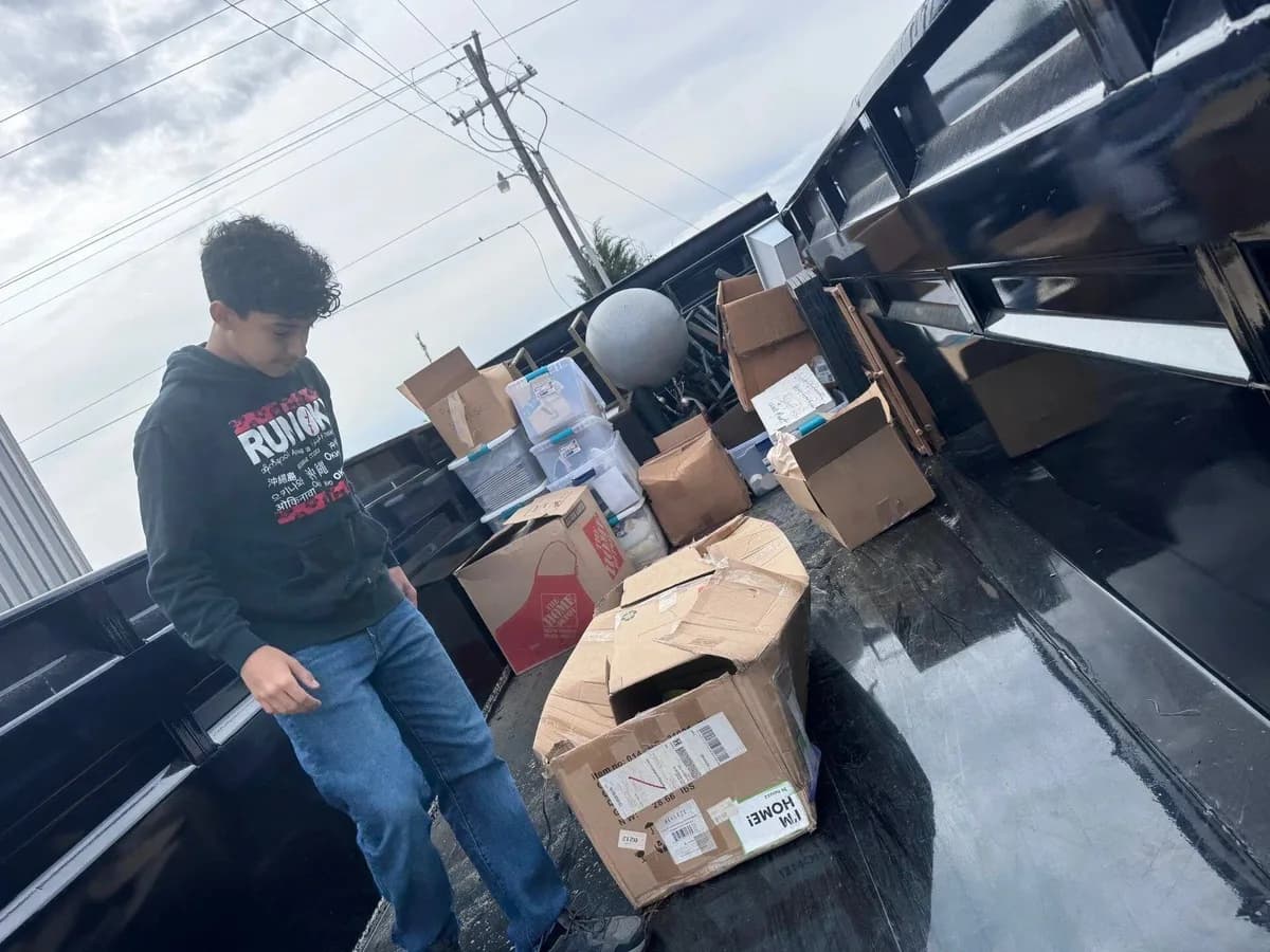 ME3 Junk Solutions loading boxed contents from a Bryan–College Station business