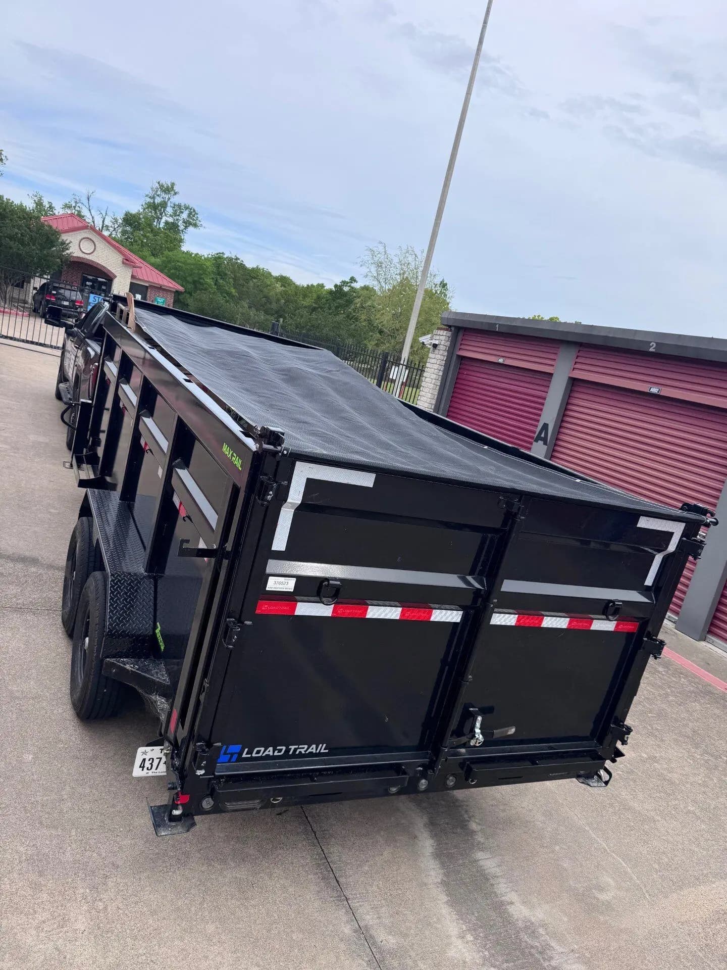 The Beast, the ME3 Junk Solutions dump trailer, staged for a commercial job in the Brazos Valley